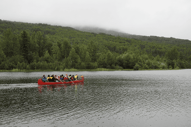 Youth canoeing on Cameron Lake this summer as part of a Fort St. John Métis Society program.