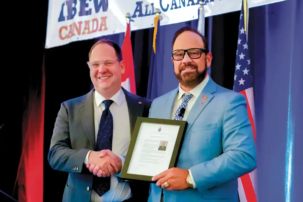 IBEW Lauded by Prime Minister, Wins Grants